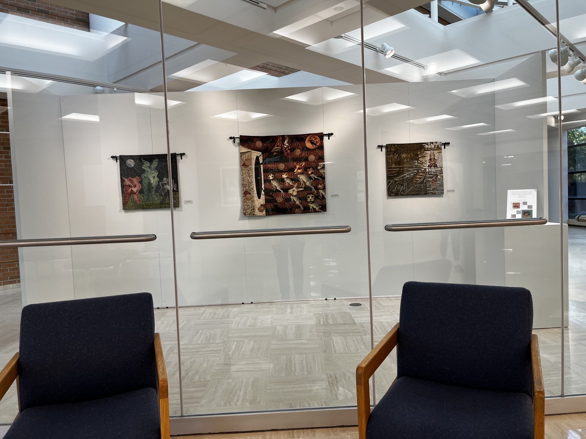 Header wall looking into the gallery from outside the center wall